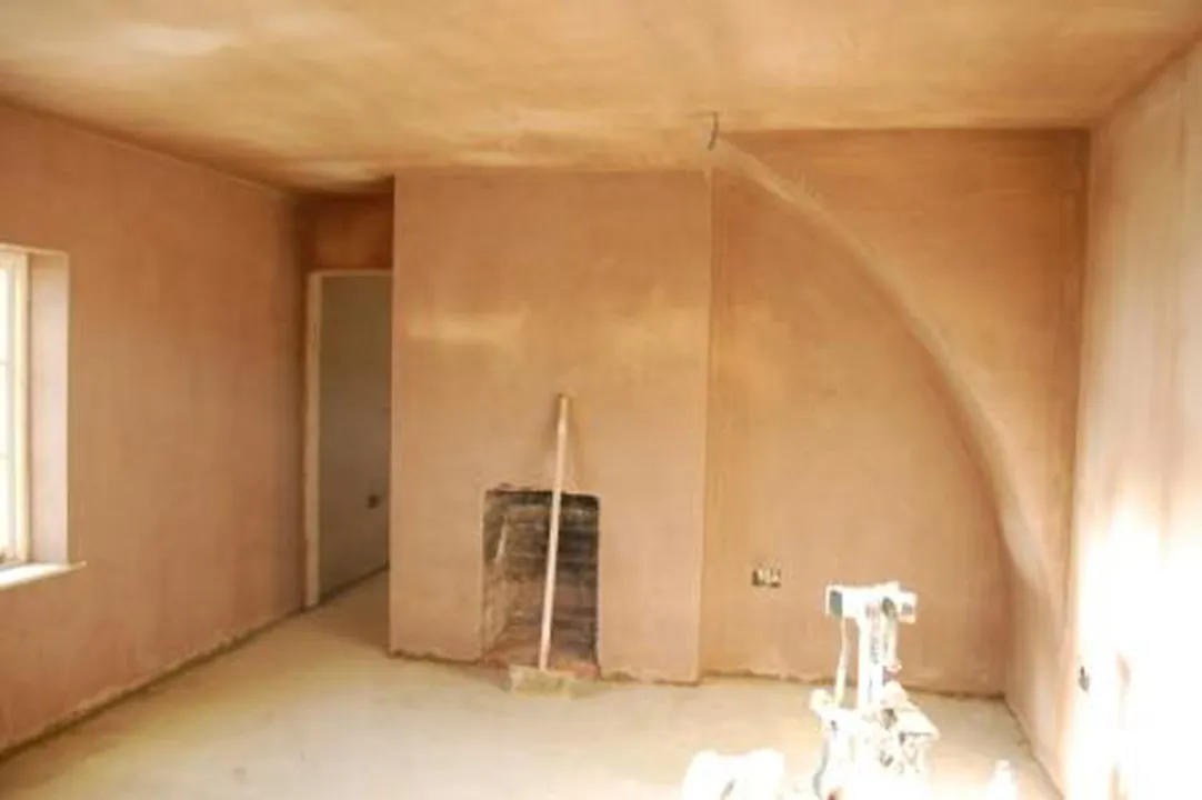 Living room with walls and ceiling freshly plastered by A.I. Myles Plastering Service, Dorking